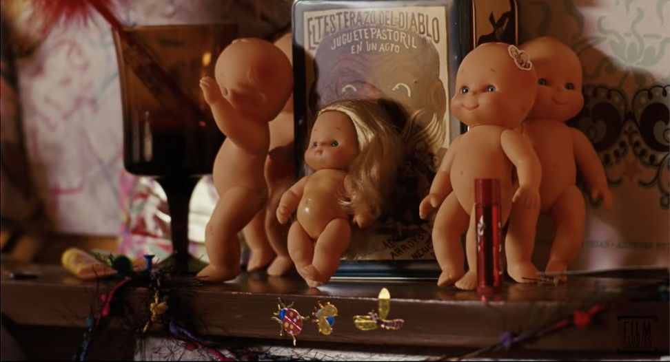 A bunch of kewpie dolls on Juno&#x27;s shelf