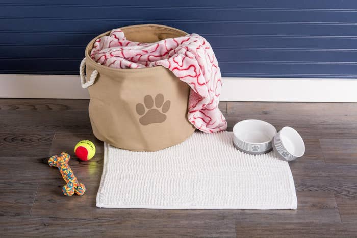 The bin in taupe holding dog supplies