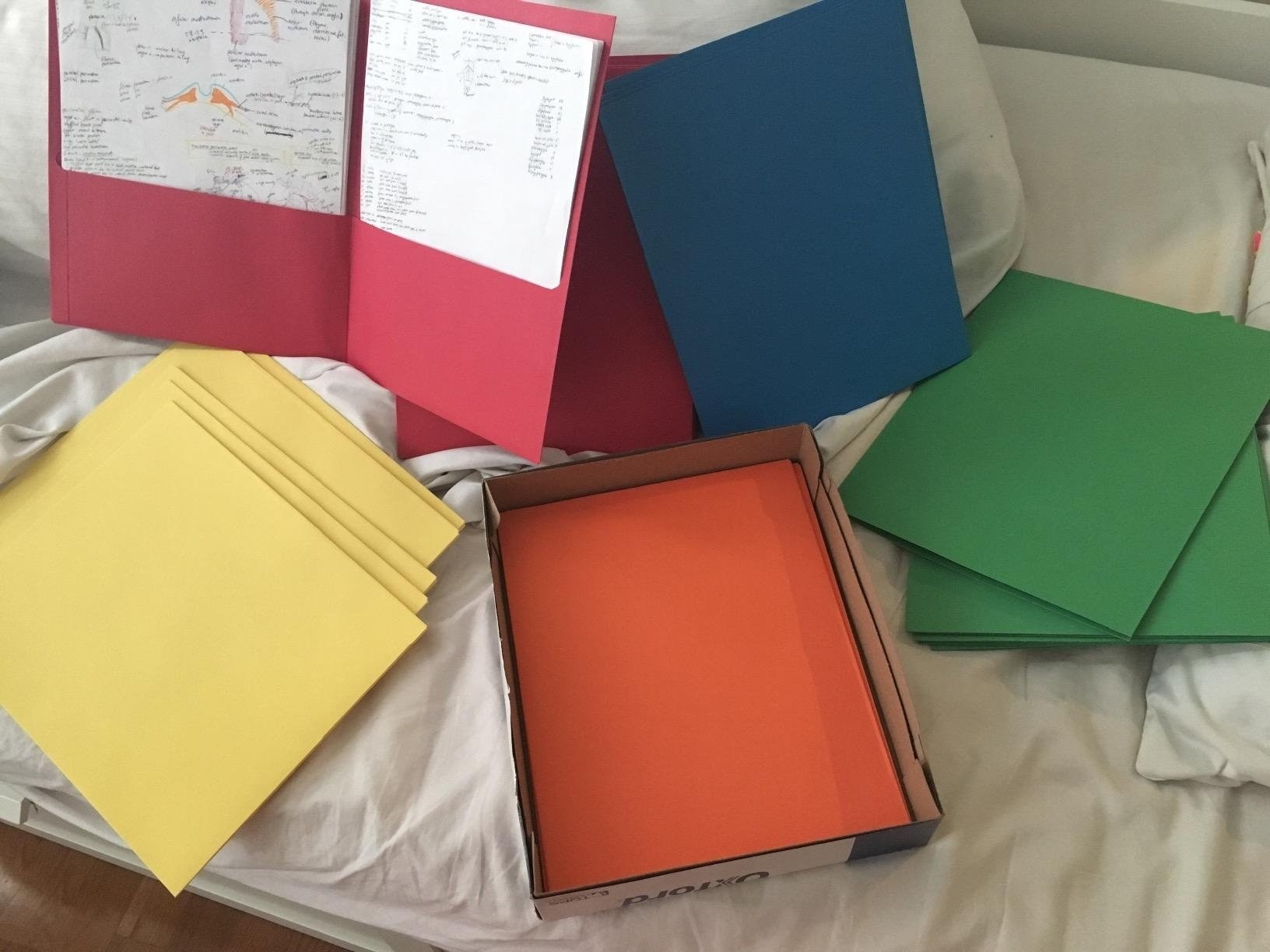 Reviewer's photo showing the folders in yellow, orange, red, blue and green