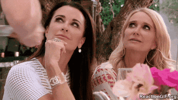 GIF of Kyle and Kim Richards looking confused