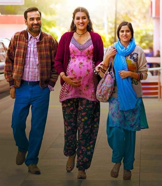 A pregnant mimi, bhanu, and shama in a still from the movie mimi