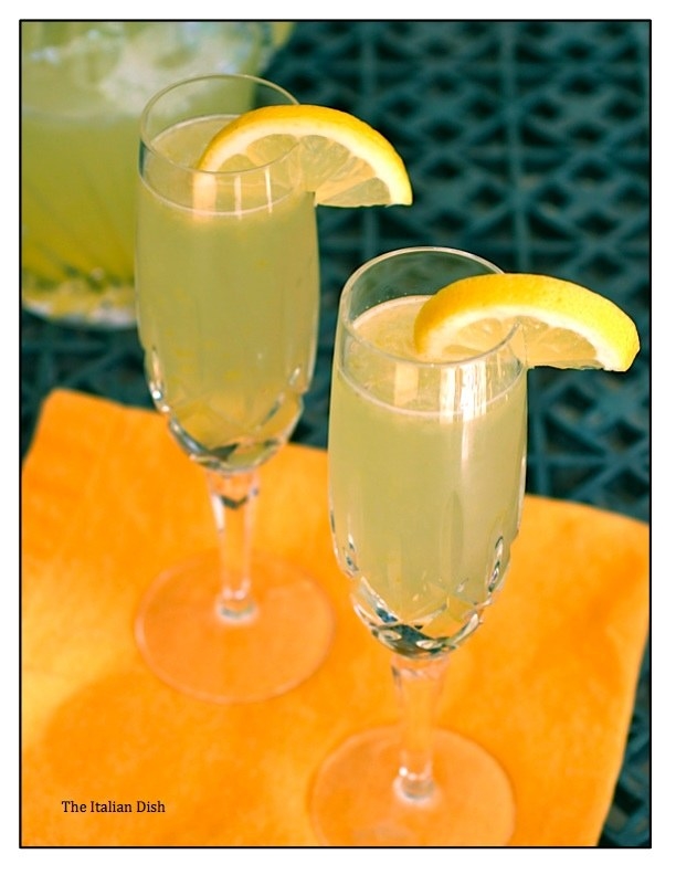 Glasses filled with sgroppino and garnished with a lemon slice