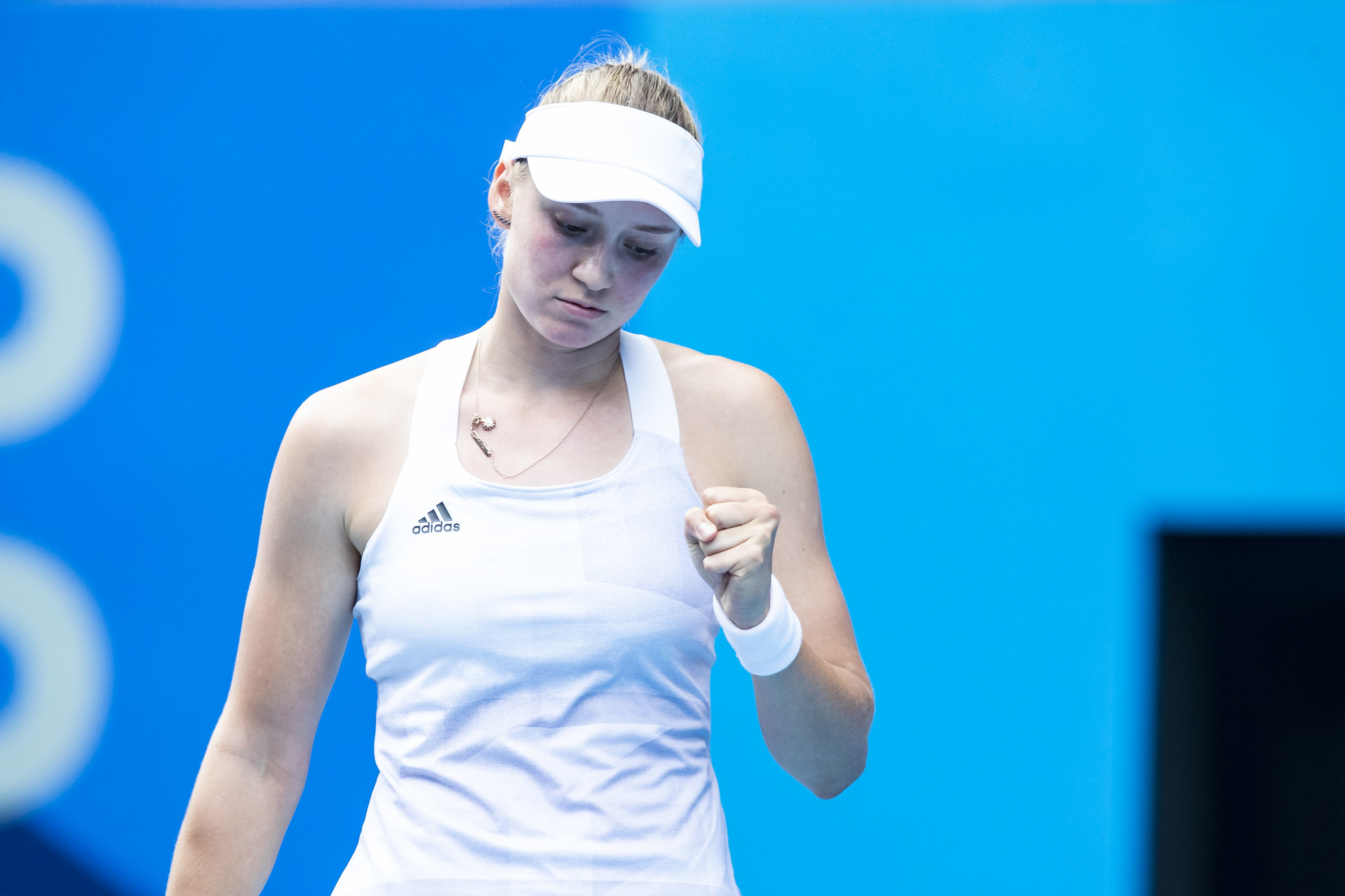 Kazakh tennis player pumping their fist