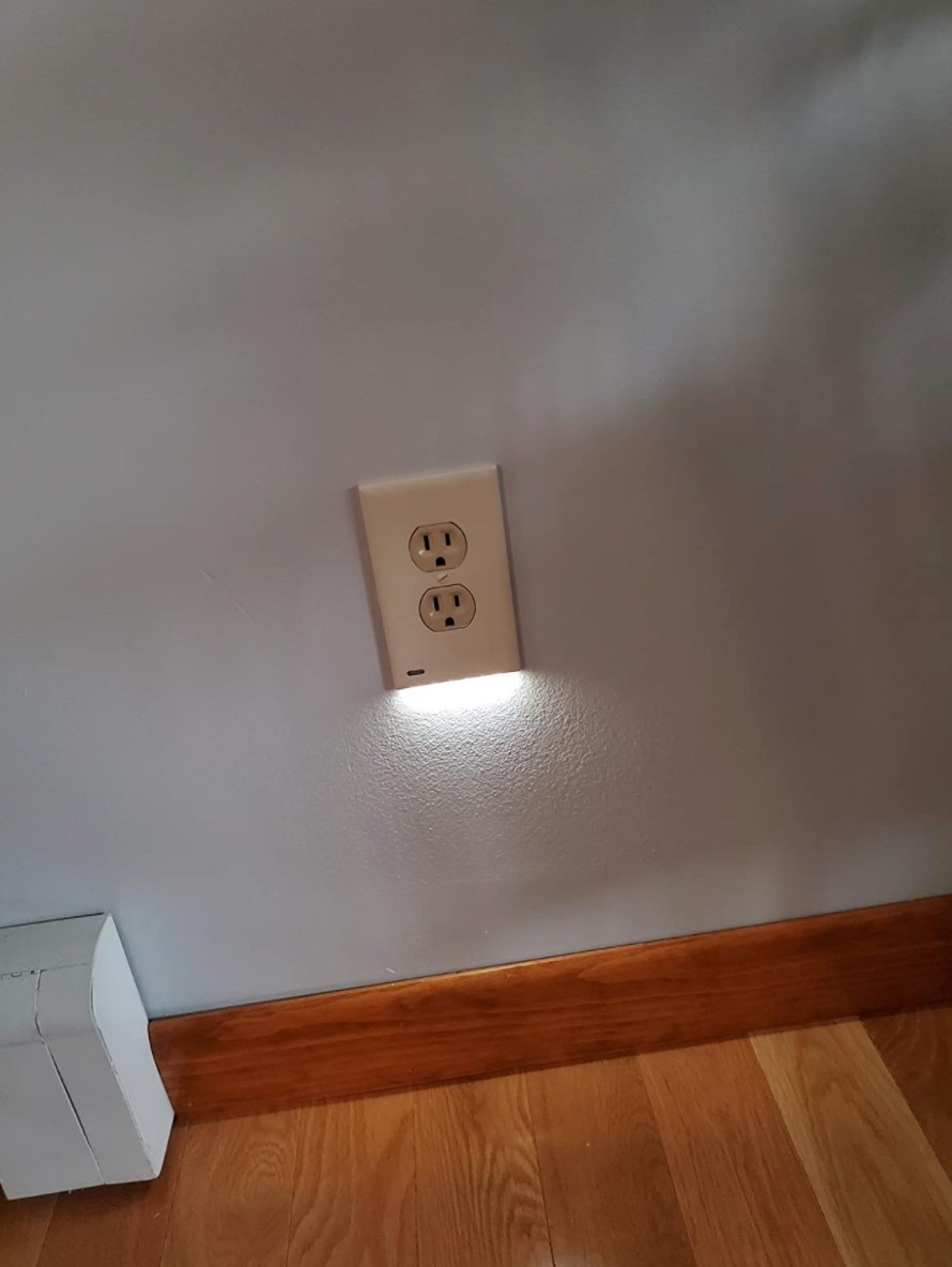 the electrical wall outlet with LED