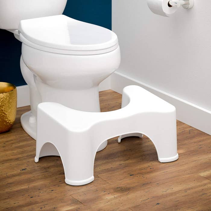 White squatty potty in bathroom