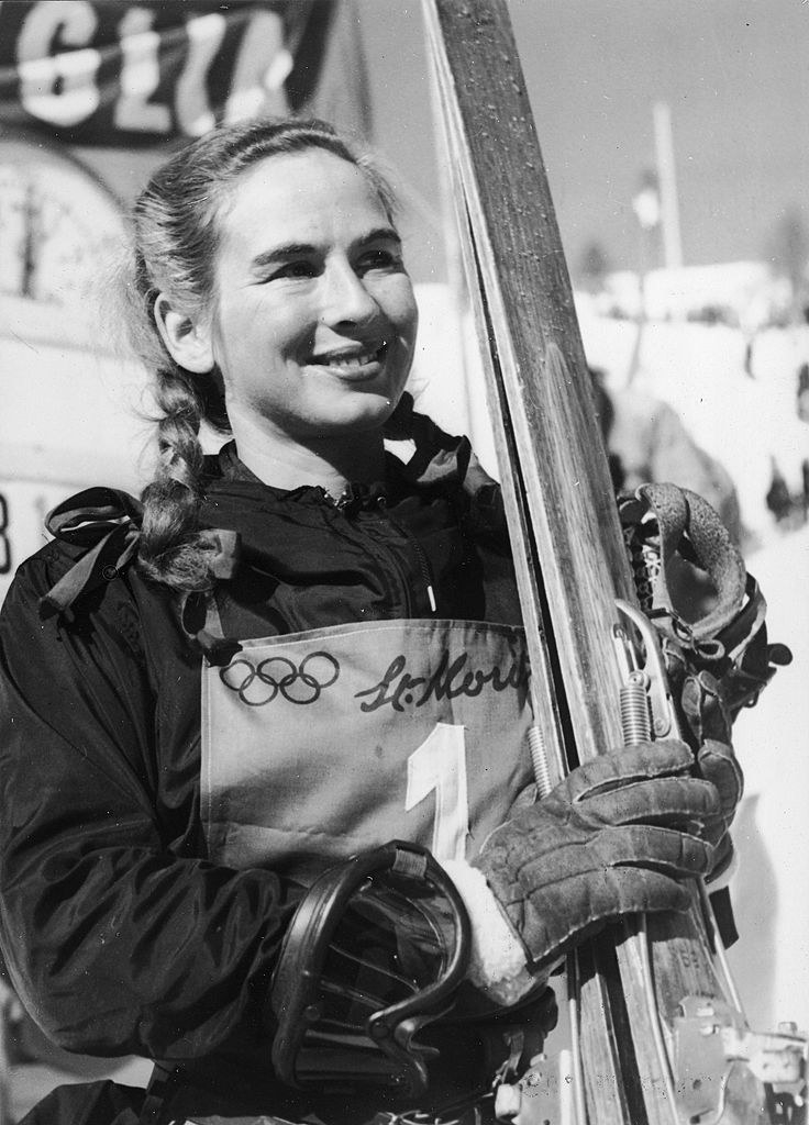 Gretchen Fraser holds a pair of skis as she poses for a portrait during the Winter Olympic Games