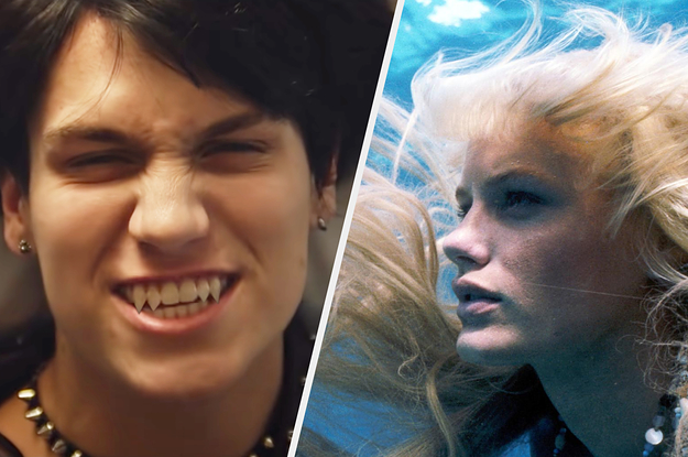 a vampire bearing his fangs next to a mermaid swimming in the ocean
