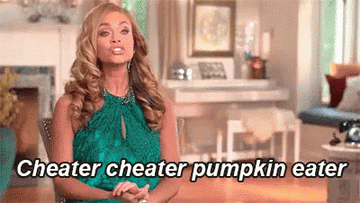 GIF of a Gizelle Bryant from Real Housewives of Potomac in a green dress saying &quot;cheater cheater pumpkin eater&quot;