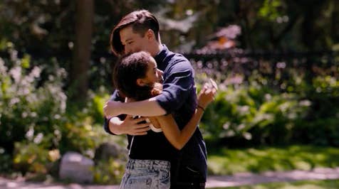 Marcus hugging Ginny as she stands there awkwardly in "Ginny and Georgia"