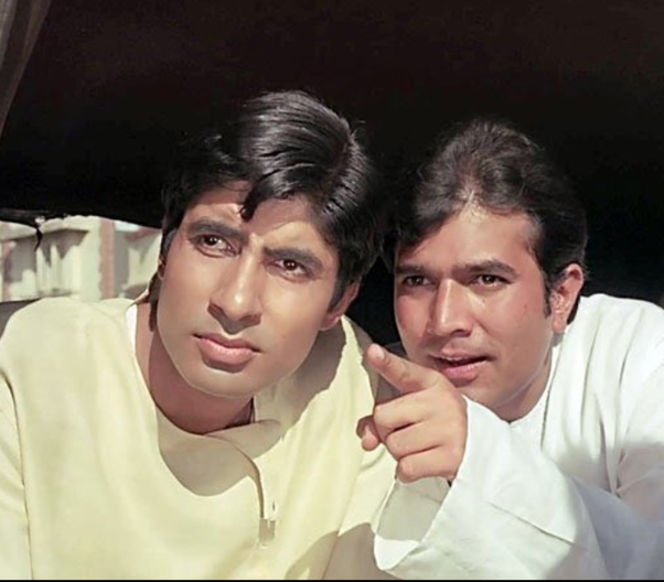 In a still from the movie Anand, Rajesh Khanna&#x27;s Anand points at something while amitabh bachchan&#x27;s dr bhaskar looks