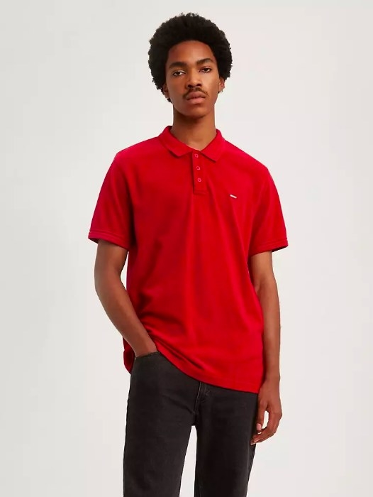 Model wearing the red polo