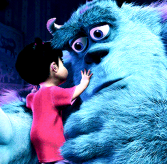 Sulley hugs Boo in Monsters, Inc.