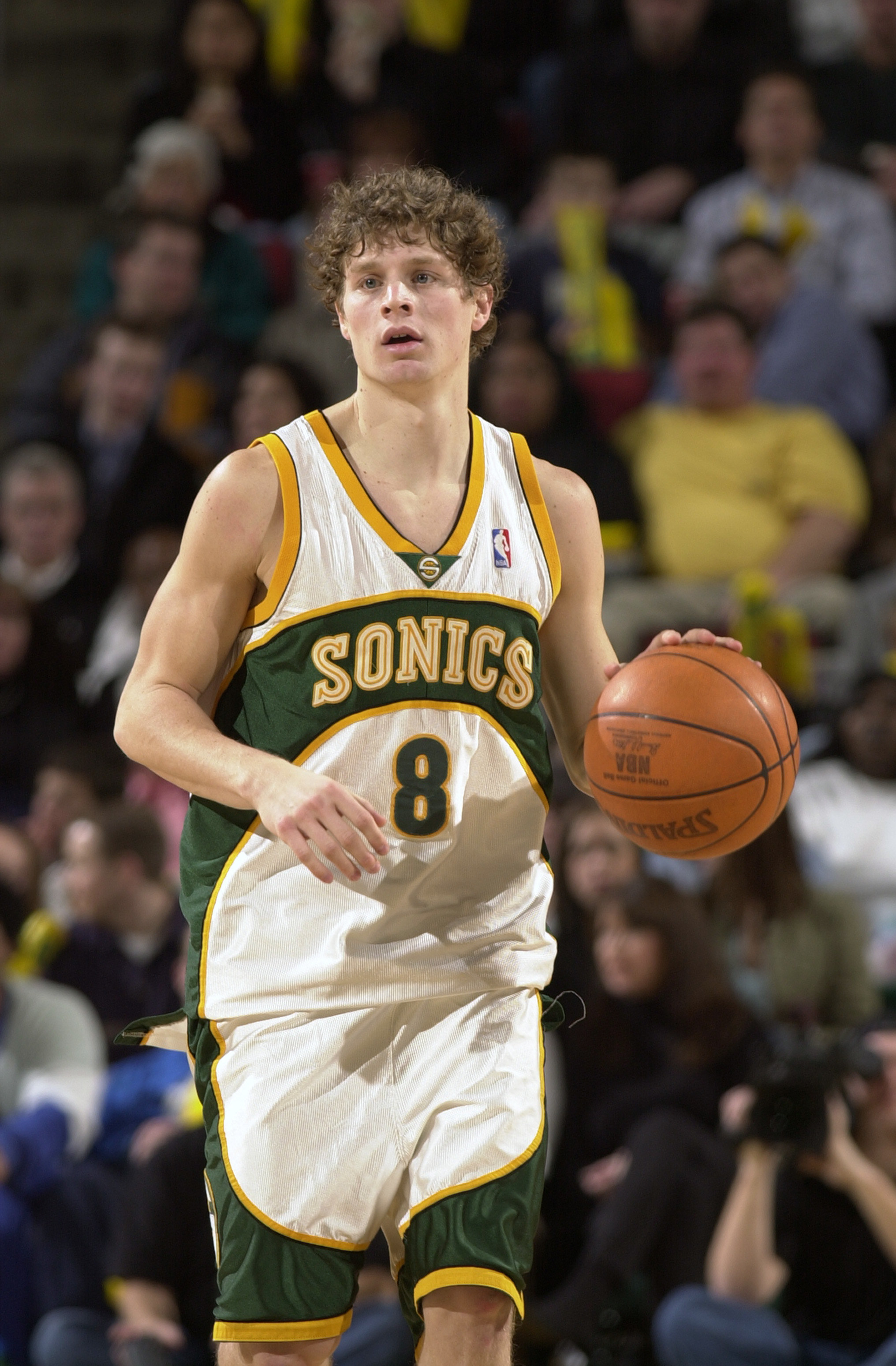 White Sonics jersey with green banner and yellow outlining