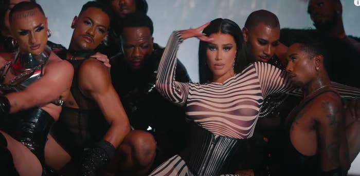 Iggy surrounded by dancers in her music video