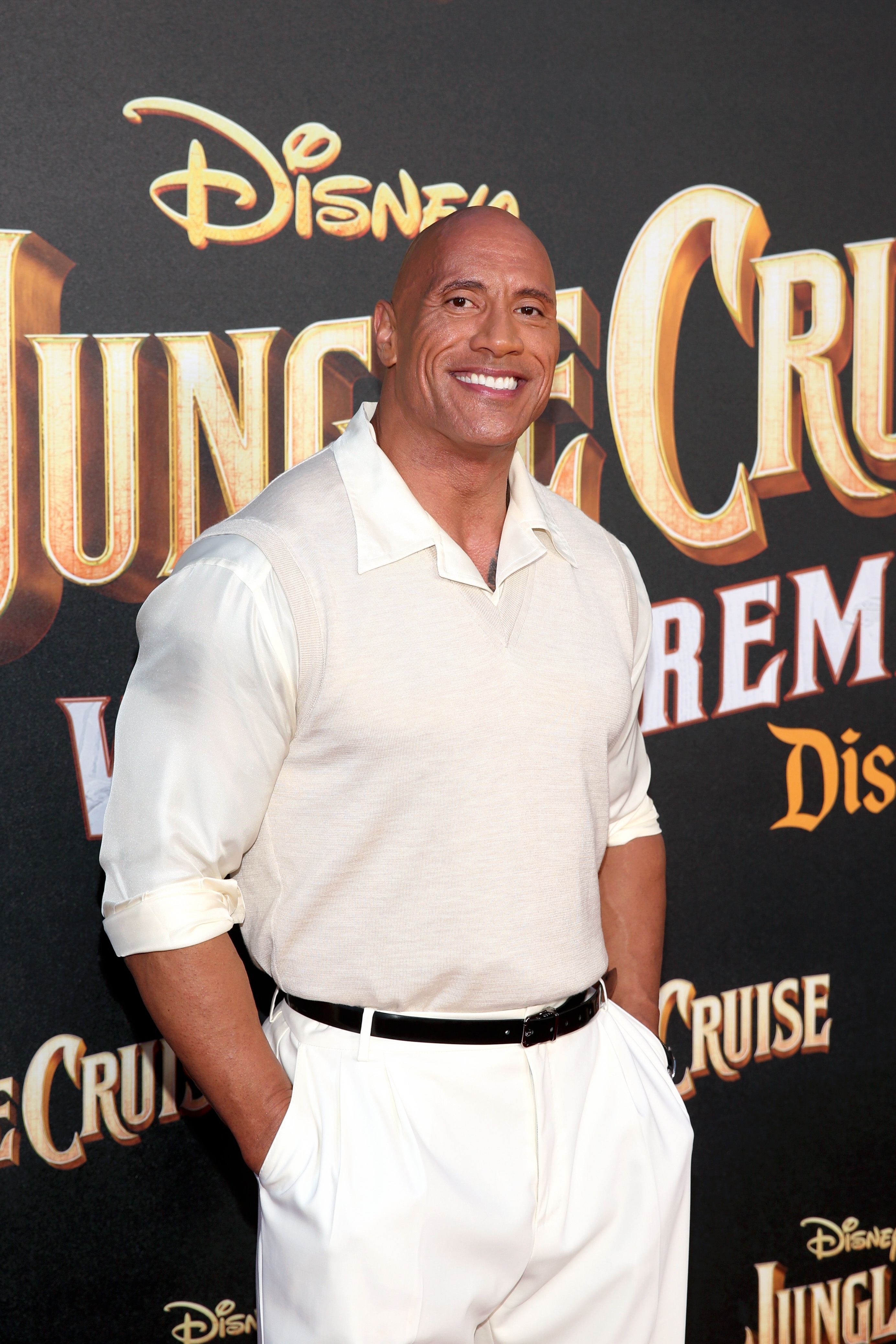 Dwayne Johnson, posing on the red carpet for the premier of his new movie, Jungle Cruise.