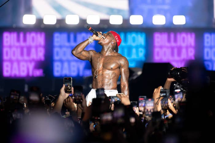 DaBaby performing onstage bare-chested