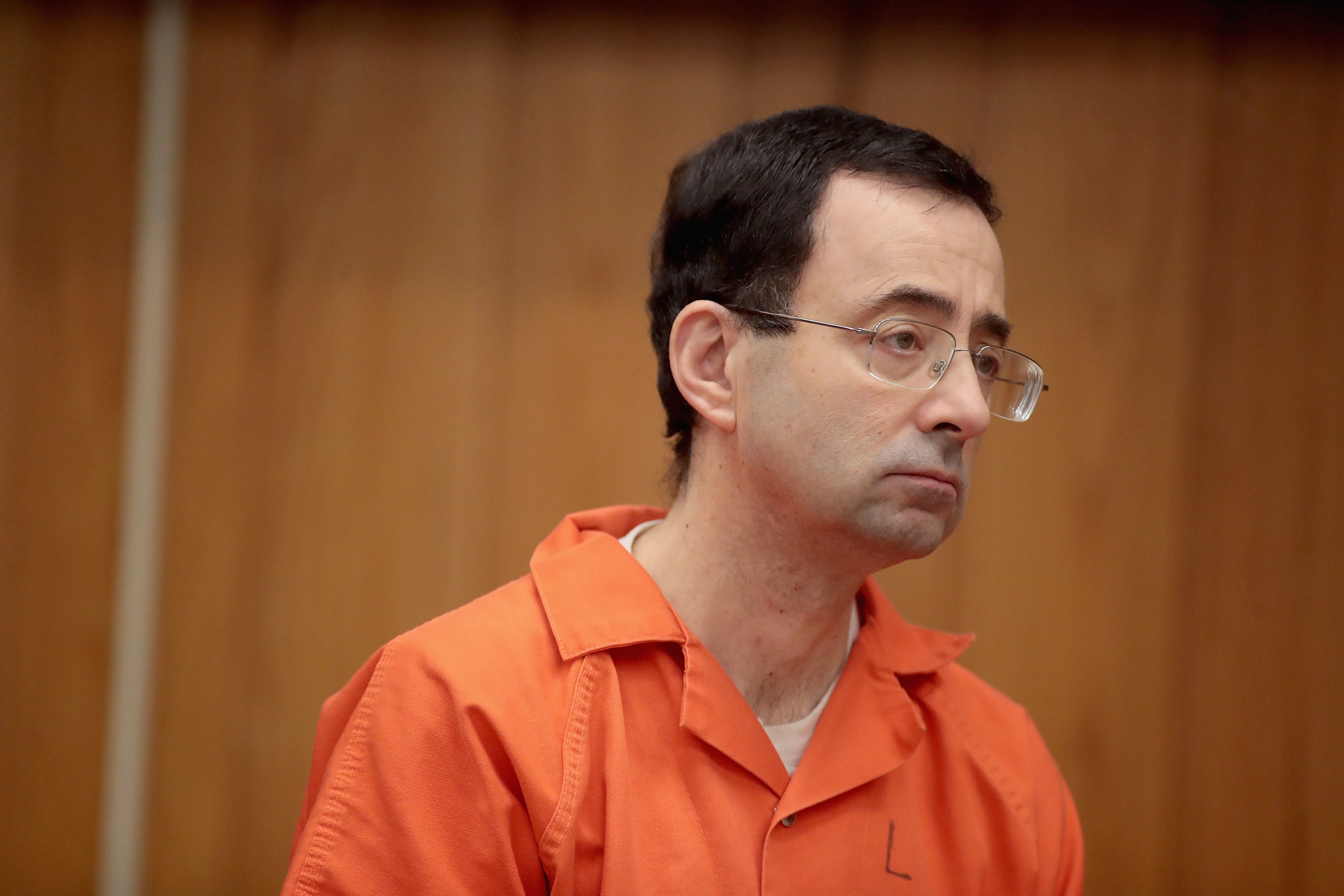 Larry Nassar in a prison jumpsuit during his trial