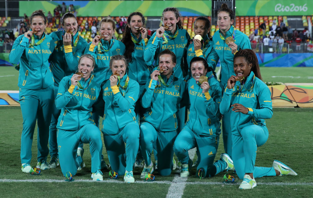 Team of Australia celebrates after winning the women&#x27;s Rugby Sevens gold medal match