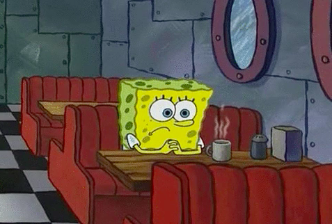 SpongeBob sitting in a diner booth by himself looking sad in &quot;SpongeBob SquarePants&quot;