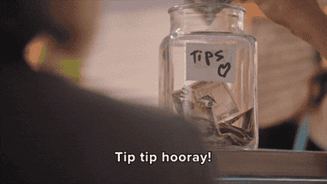 Someone putting money in a tip jar and the employee saying &quot;tip tip hooray&quot;