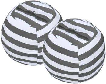 Two stuffed bean bag covers in grey and white stripes