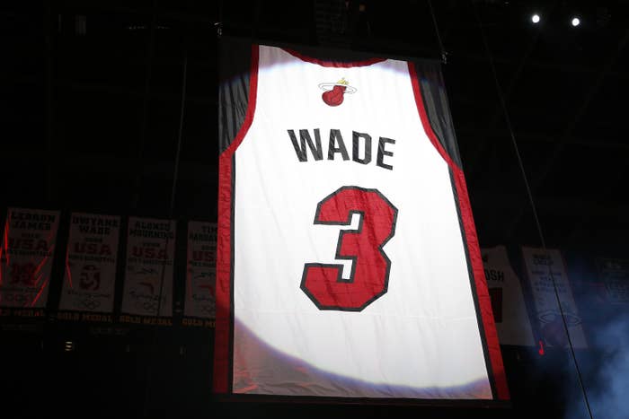 Dwayne Wade&#x27;s White Miami Heat jersey hanging in the rafters
