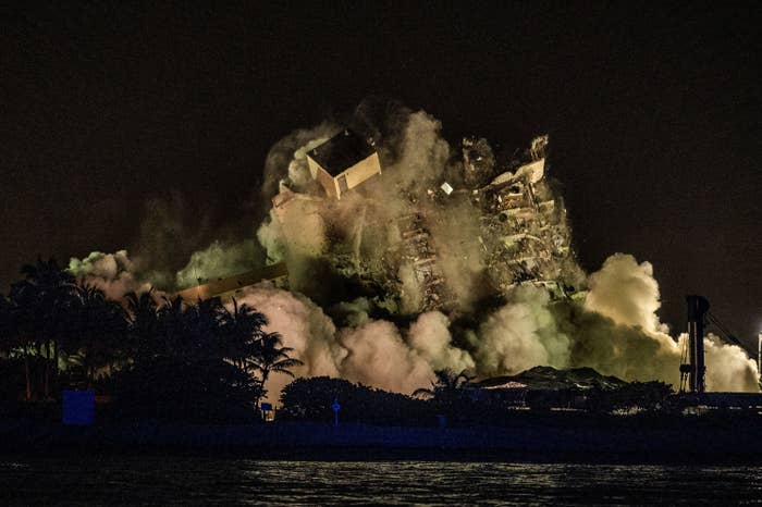 The standing tower of the Surfside condo is demolished in a controlled demolition