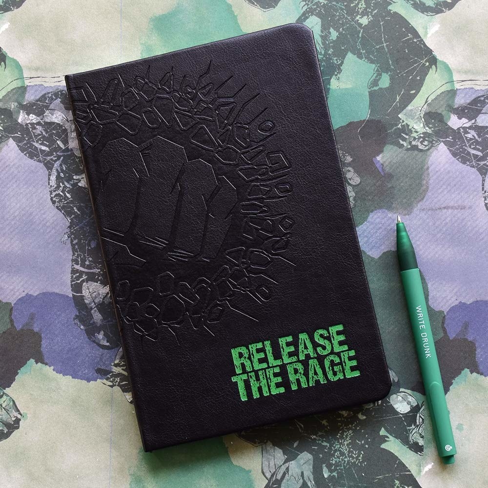 Black notebook cover with &#x27;Release The Rage&#x27; in green and a fist smashing through a wall, with a pen next to it.