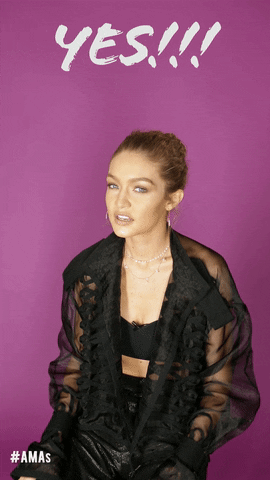 Gigi Hadid cheers &quot;Yes!&quot; backstage at the American Music Awards