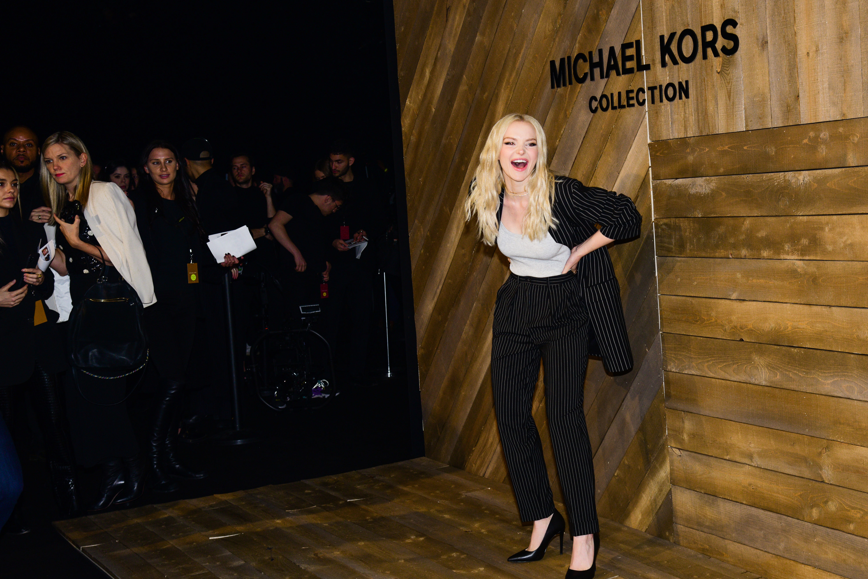 Dove Cameron attends the Michael Kors AW/20 Fashion Show at American Stock Exchange on February 12, 2020, in New York City