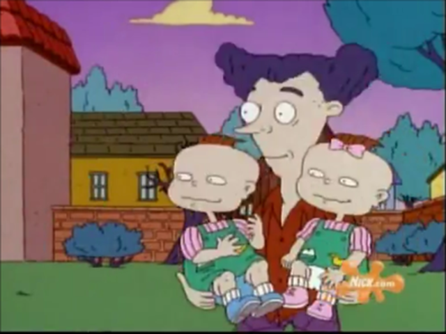 Howards holding his twins