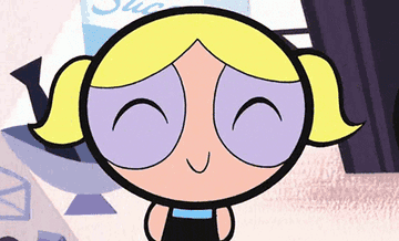 Bubble from the powerpuff girls jumping up and down giddily