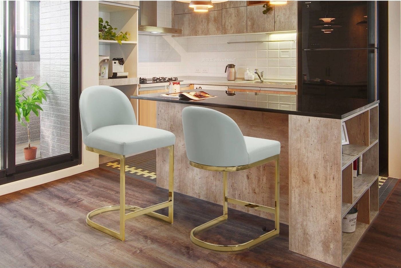 plush blue bar stools with backs on a gold stand