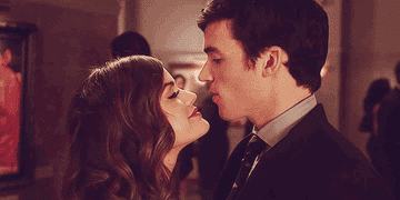 Ezra and Aria kissing on Pretty Little Liars