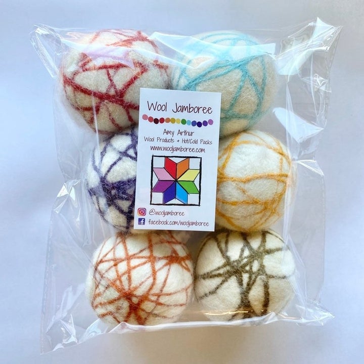 the wool dryer balls in their packaging