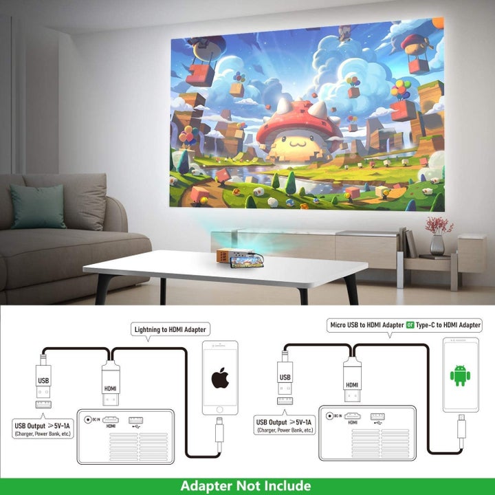 A living room with the mini projector projecting a film