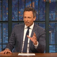Seth Myers looking confused and pointing