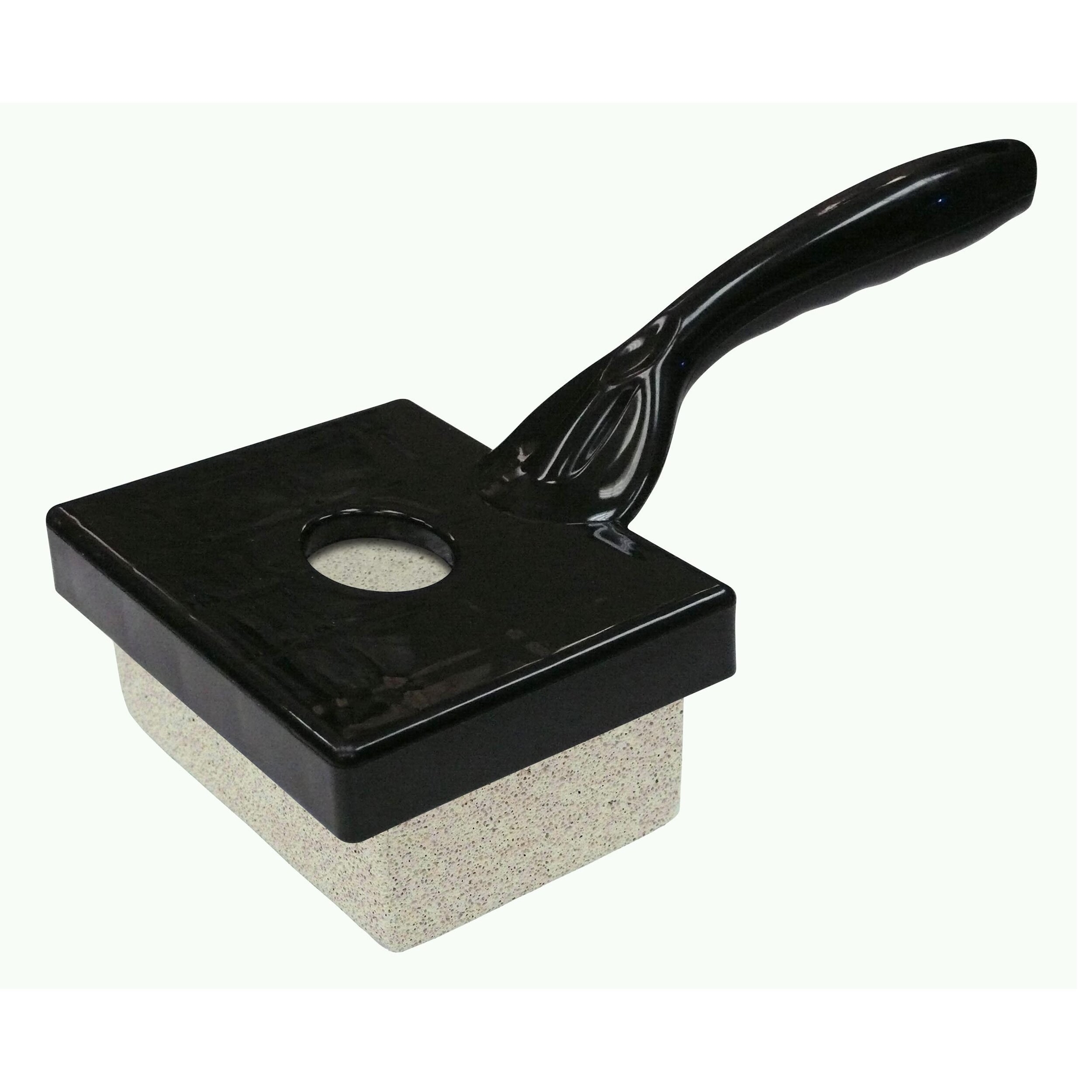 the stone brush with a black handle