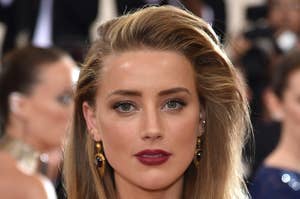 Amber Heard wears a dress and poses for the camera at the Met Gala in 2016