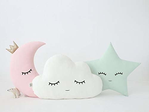 One pink half moon pillow, one cloud pillow and one green star pillow with eyes on them