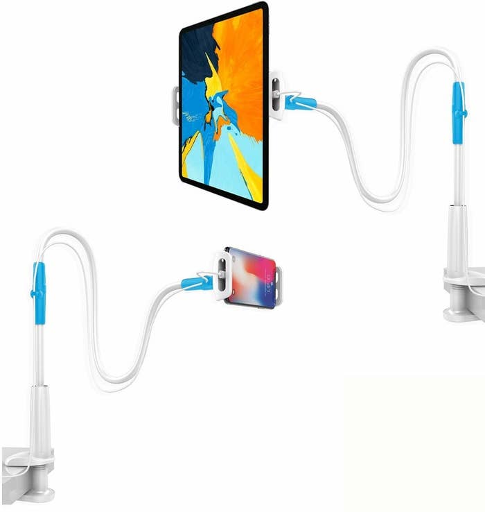 A mobile holding stand with a flexible arm seen here holding a tablet and a mobile phone.