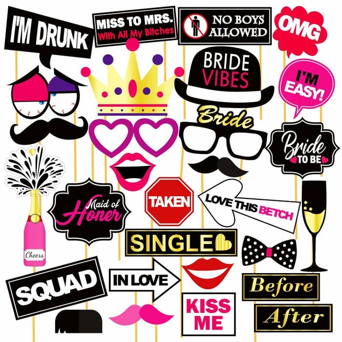 Quirky photo booth props with placards that say - Bride to Be, Squad, Maid of Honor, Taken, etc.