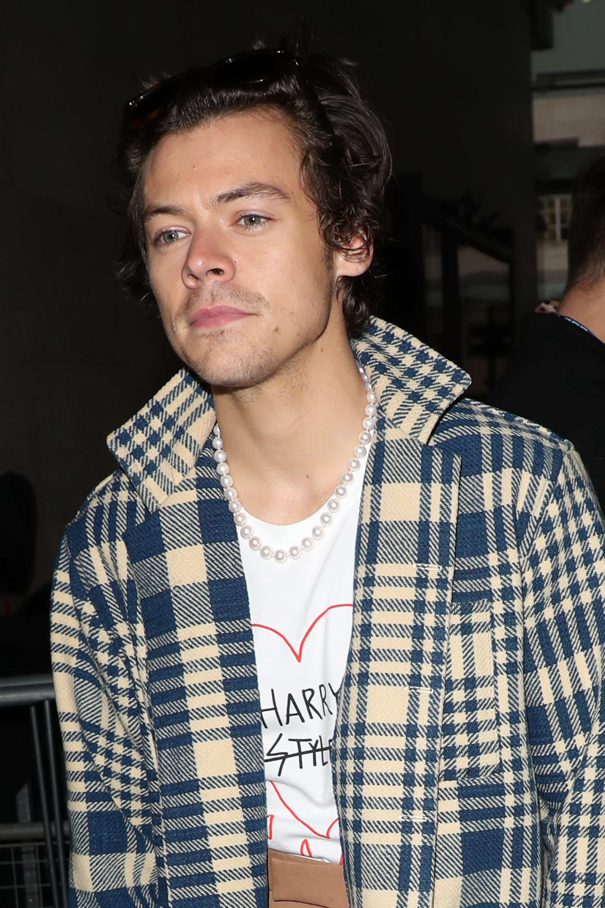 Harry Styles seen leaving BBC Radio One after performing in the Live Lounge on December 18, 2019 in London, England