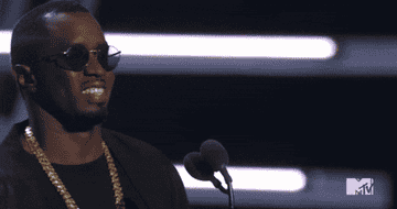 Diddy smiles on stage at the 2020 MTV Video Music Awards