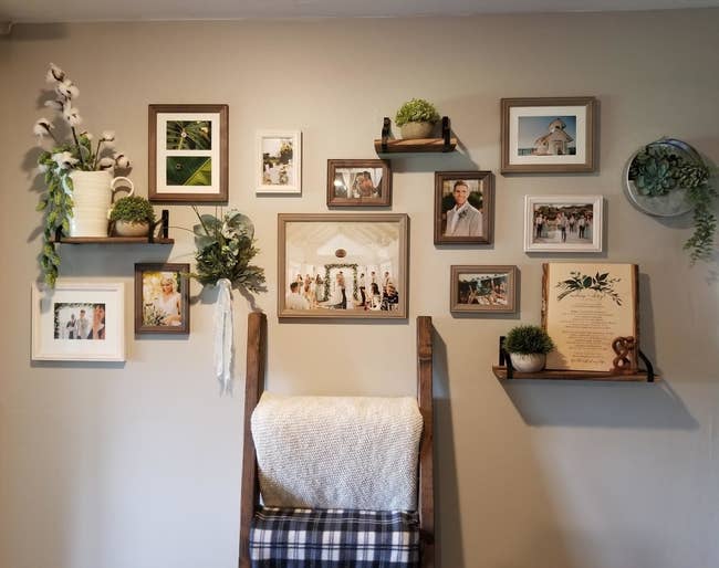 reviewer image of the multi/gray gallery set hanging from their wall along with small display shelves