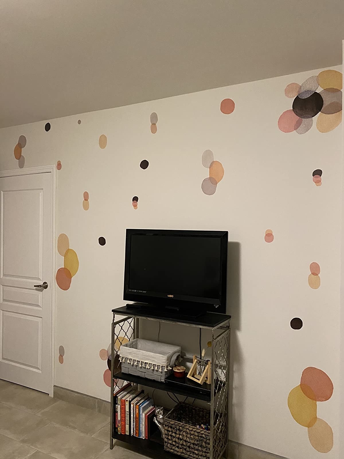 reviewer image of several abstract watercolor decals on a wall