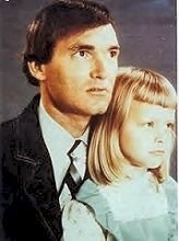 Franklin Delano Floyd and his stepdaughter, Suzanne Marie Sevakis, posing for a family photo