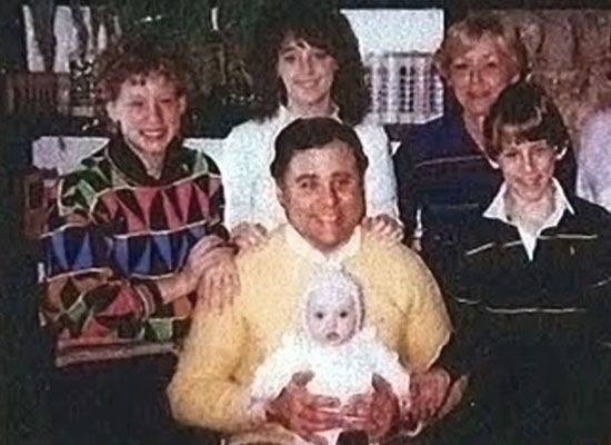 John Edwards Robinson holding Tiffany Stasi as a baby