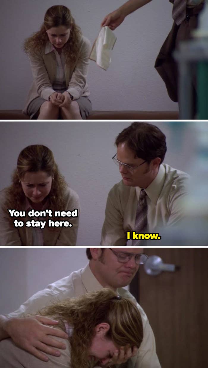 Dwight consoling a crying Pam by wrapping his arm around her shoulder