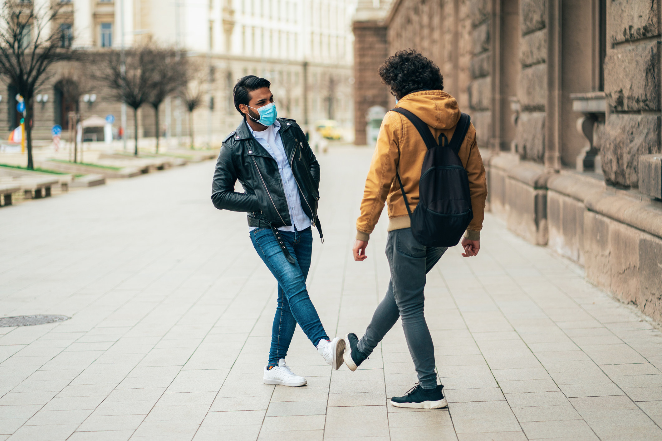 two friends  greeting each other